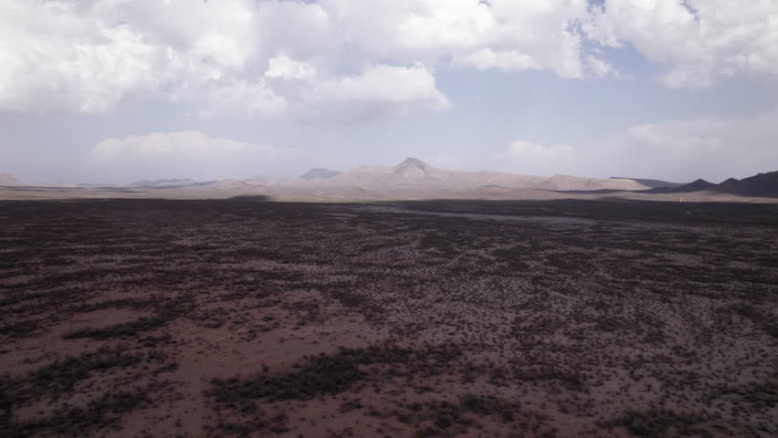 The West Texas Chihuahuan Desert in the Big Bend Region, aerial view with puffy clouds and distant hills