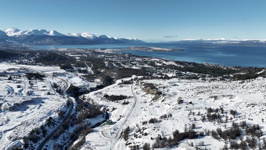 Snowy Forest In Ushuaia End Of The World Argentina. Captivating Aerial View Of Plantations Forming Geometric Patterns. Nature Travel Destination Snow Covered Forest Trees.