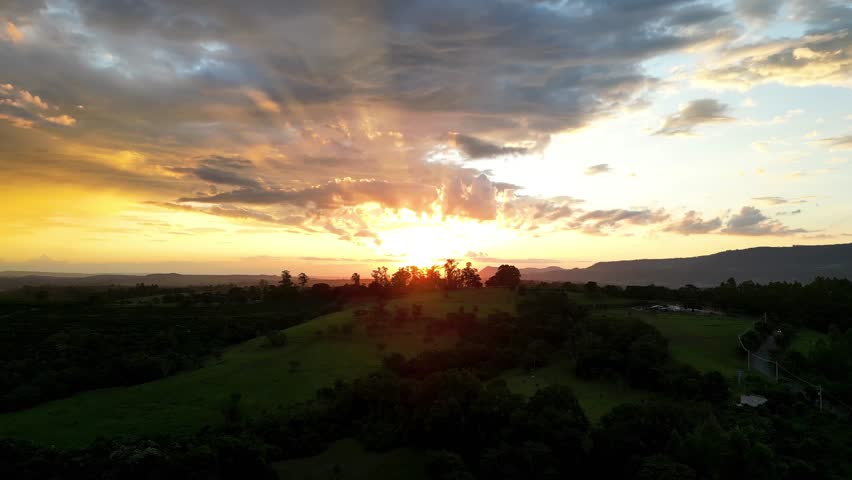 Sunset Sky In Rural Landscape Countryside Brazil. Birds Eye View Of Peaceful Mountains Valley And Forest Trees. Countryside Agricultural Rural Field. Countryside Rural Sky.