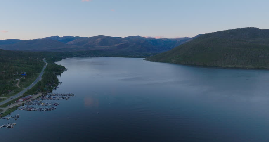 Orbiting shot of Shadow Mountain Lake at sunset in Colorado