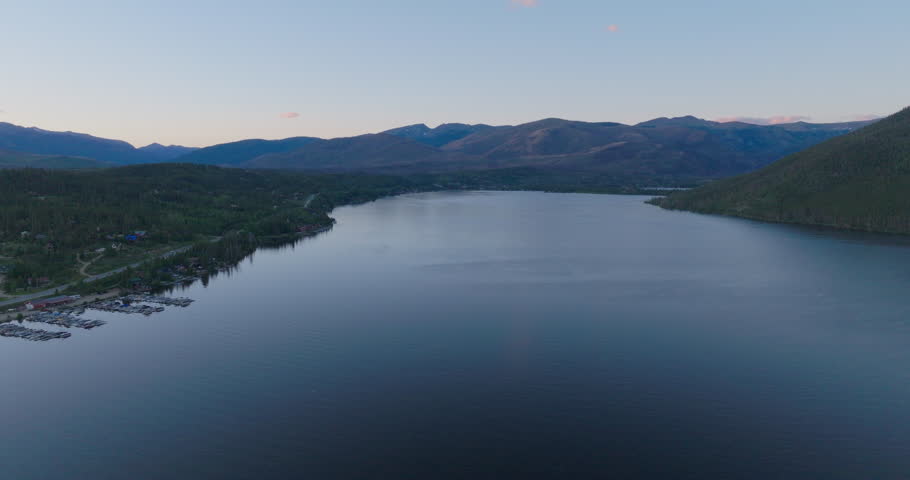Orbiting shot of Shadow Mountain Lake at sunset in Colorado