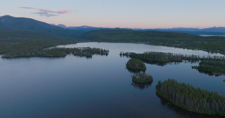 orbiting Drone shot of Shadow Mountain Lake at sunset in Colorado