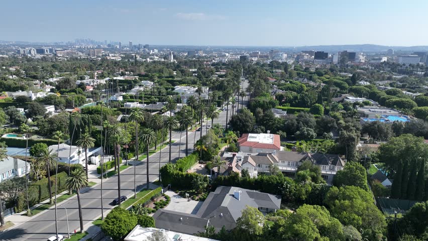 Beverly Hills In Los Angeles California United States. Aerial View Of A Bustling City With High-Rise Buildings And Traffic. Business Sky Clouds Downtown Cityscape. Backgrounds Panoramic.