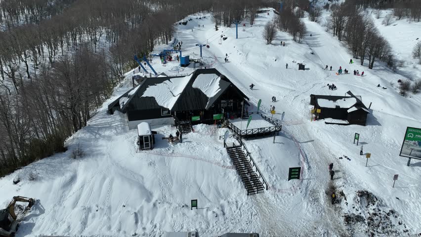 Cable Car In Villarrica Vulcan Pucon Chile. Ski Lift Passing Over Frozen Mountain In Winter Landscape. Nature Travel Snow Covered Forest Trees. Snow Covered Patagonia Aerial. Villarrica Vulcan Pucon.