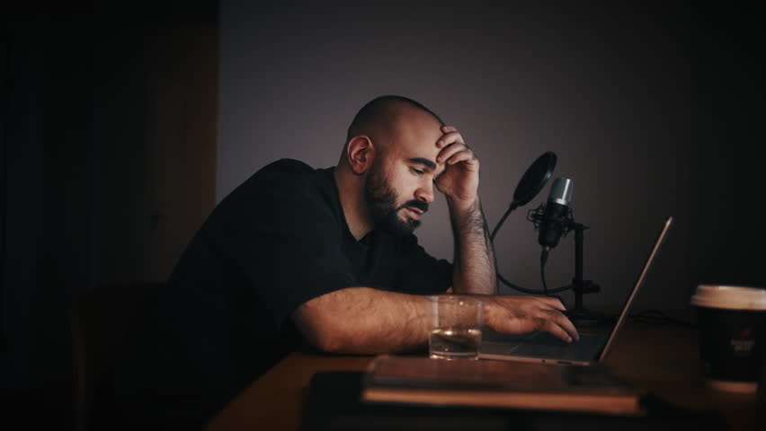 Exhausted Middle Eastern Man Falls Asleep at Desk While Working on Laptop – Burnout