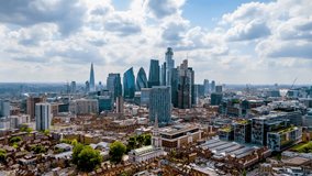 Aerial hyper time lapse view of the skyline at the City of London, England, during a cloudy day - Powered by Shutterstock - Get 15% off with code: PIKWIZARD15