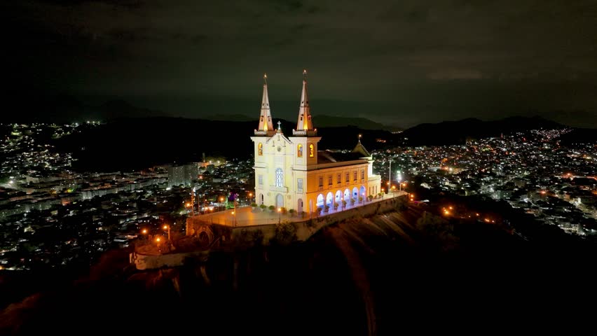Penha Basilica In Rio De Janeiro Brazil. Stunning Baroque Church Contrasts With The Landscape . Night Freeway Road Downtown Cityscape. Night Up Above. Cities Of The World. Rio de Janeiro Brazil.
