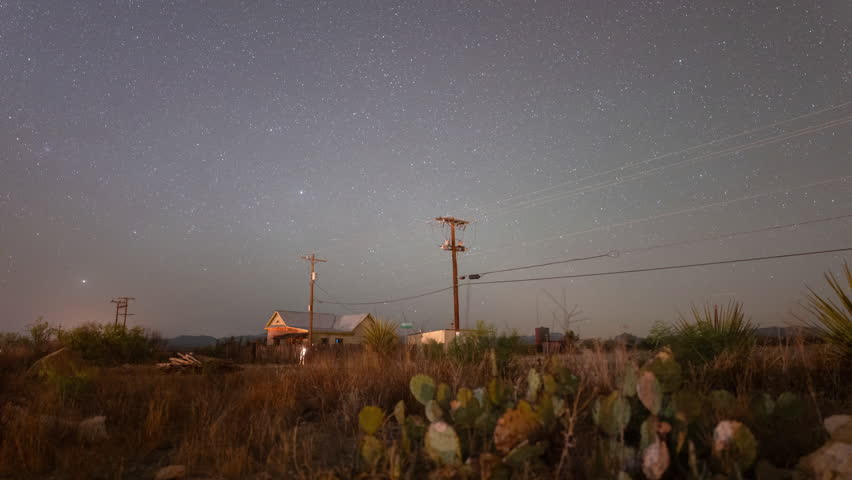 Stars trail in to long streaks over a west Texas landscape - Astro Time lapse