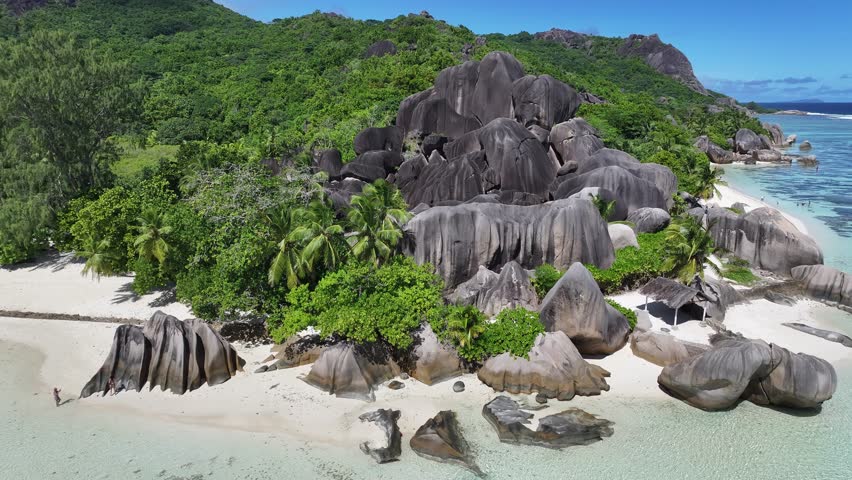 Anse Source D Argent Beach In La Digue Island Victoria Seychelles. Breathtaking Aerial View Of A Lush Tropical Coastline Scenery. Shore Sky Clouds Beach Sea. Seaside Scenic Coastline.