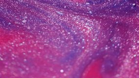 Abstract ink mixing, macro shot with glittery paint details and vibrant colors blending - Powered by Shutterstock - Get 15% off with code: PIKWIZARD15