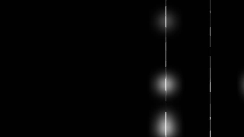 A striking black and white abstract middle motion featuring vertical streaks of light against a completely black background