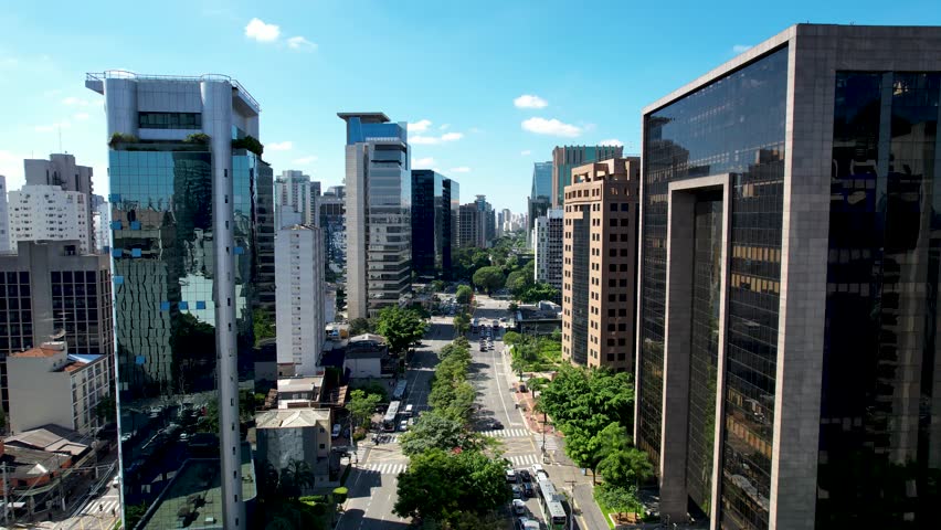Faria Lima Avenue In Sao Paulo Brazil. Aerial View Of A High-Rise Buildings And Traffic Showcasing Urban Life. Business Sky Clouds Downtown Cityscape. Business Backgrounds Panorama. Sao Paulo Brazil.