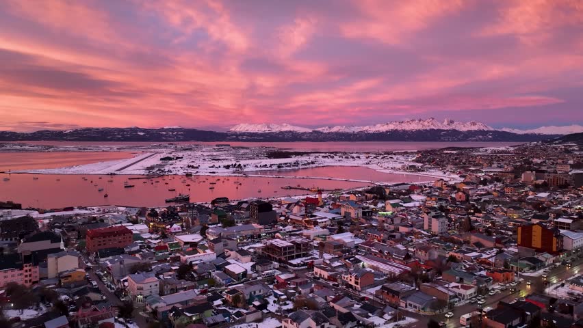 Patagonia Sunrise In Ushuaia Patagonia Argentina. Bustling Downtown Cityscape With Modern Buildings. Sunset Snow Fall Tourism Glacial Landscape Snowcapped. Outdoor. Ushuaia Patagonia.