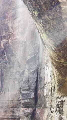 Weeping Rock in Zion National Park shows mist from dripping water