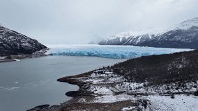 Perito Moreno Glacier In El Calafate Santa Cruz Argentina. Stunning View Of Icebergs Breaking Off Into The Water . Snowflakes Lake Glacial Snow Mountain. Snowflakes Nature. El Calafate Santa Cruz. - Powered by Shutterstock - Get 15% off with code: PIKWIZARD15