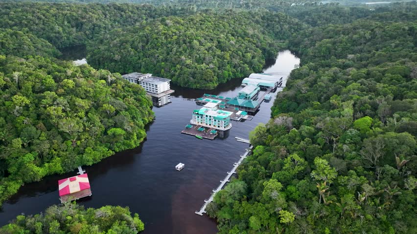 Jungle Hotel In Manaus Amazonas Brazil. River Flowing Through Lush Green Forest Landscape. Forest Vegetation Amazon Green. Forest Inundation. Manaus Amazonas.