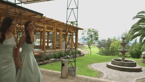 A touching moment in which the bridesmaids happily run toward the bride and hug her joyfully. The bride holds her bouquet while everyone shares a moment filled with affection and emotion. - Powered by Shutterstock - Get 15% off with code: PIKWIZARD15