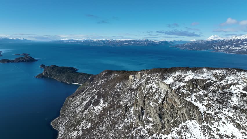 Beagle Channel In Ushuaia Tierra Del Fuego Argentina. Captivating Aerial View Of Plantations Forming Geometric Patterns. Nature Tourism Icon Snow Covered Forest Trees. Nature Discover Aerial.