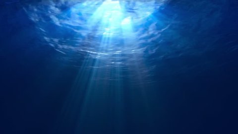 blue gentle waves, slow motion looped ocean surface seen from underwater (hd, 1080p high definition, seamless loop) rays of sunlight shining through Great for backgrounds