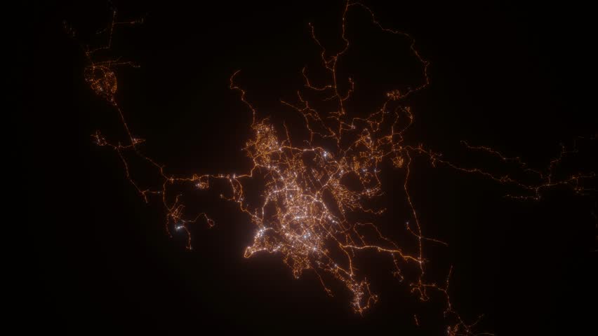 Port Moresby (Papua New Guinea) aerial view at night. Top view on modern city with street lights. Camera is flying above the city, moving backward