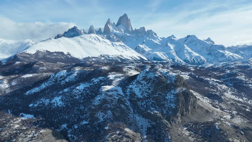 Fitz Roy Mountain In El Chalten Patagonia Argentina. Aerial View Of Massive Glacier Calves Into A Lagoon Of Icy Water. South Pole Tourism Glacial Snow Mountain. South Pole Frost Outdoor.
