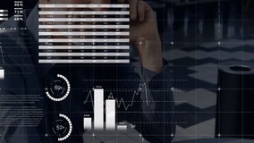 Man holding smartphone to ear starting call and activating financial dashboards with gauges, charts. Finance, analytics, data visualization, business, technology, professional, dashboard - Powered by Shutterstock - Get 15% off with code: PIKWIZARD15