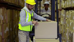Warehouse staff loading box on forks causing network icons showing supply chain connections. Manufacturing, logistics, inventory, collaboration, industrial, teamwork, technology - Powered by Shutterstock - Get 15% off with code: PIKWIZARD15