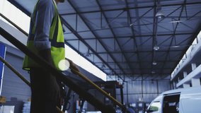 Warehouse manager activating VR headset manipulating media network icons for visualizing logistics. Technology, innovation, futuristic, digital, connectivity, scanning, enterprise - Powered by Shutterstock - Get 15% off with code: PIKWIZARD15