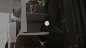 Forklift operator engaging network overlay and using hydraulic controls for warehouse logistics. Industrial, technology, safety, connectivity, automation, logistics, infrastructure - Powered by Shutterstock - Get 15% off with code: PIKWIZARD15