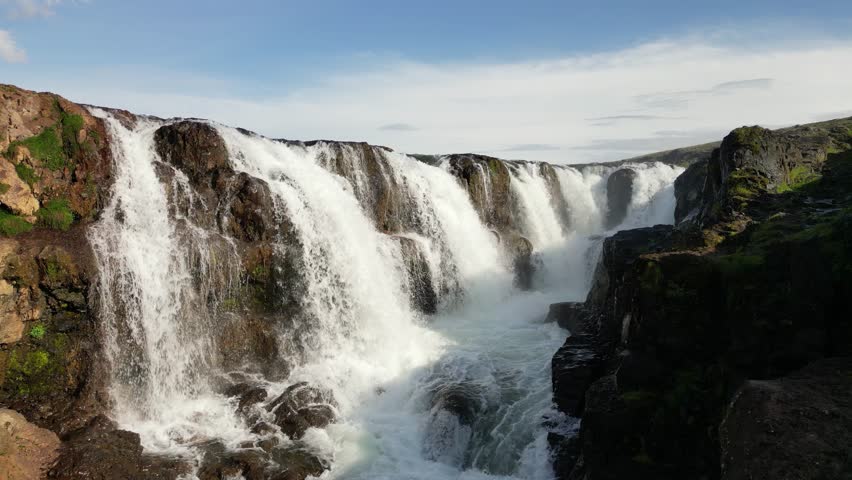 Gullfoss Waterfall, Majestic waterfall cascading down rugged cliffs into a churning pool below, a stunning display of Iceland