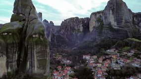 Meteora is a rock formation, represent hill-shaped rounded boulders and have an interesting texture. Greece. - Powered by Shutterstock - Get 15% off with code: PIKWIZARD15