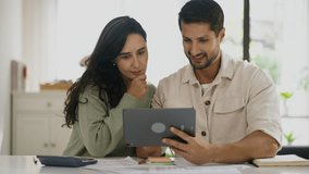 Modern couple bonding at home with electronic banking, shopping, and social media, highlighting connection, happiness, and leisure activity.
 - Powered by Shutterstock - Get 15% off with code: PIKWIZARD15