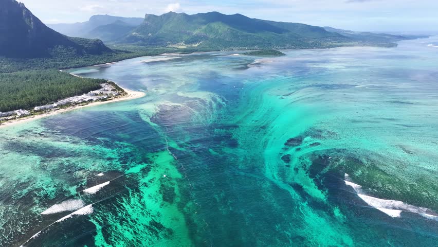 Underwater Waterfall In Le Morne Beach Mauritius Island Mauritius. Stunning Tropical Coastline Beach Scene Viewed From Above. Island Life Landscape Idyllic Beautiful. Island Life Water Edge Coast.