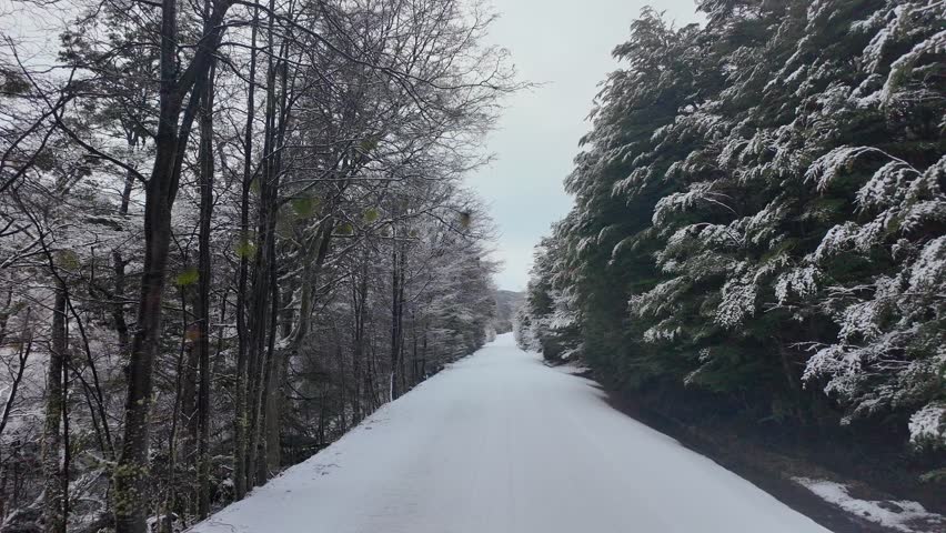 Snow Capped Road In Ushuaia Tierra Del Fuego Argentina. Powerful Landscape Of The Vehicles In A Famous Road . South Pole Tourism Glacial Snow Mountain. South Pole Frost Outdoor.