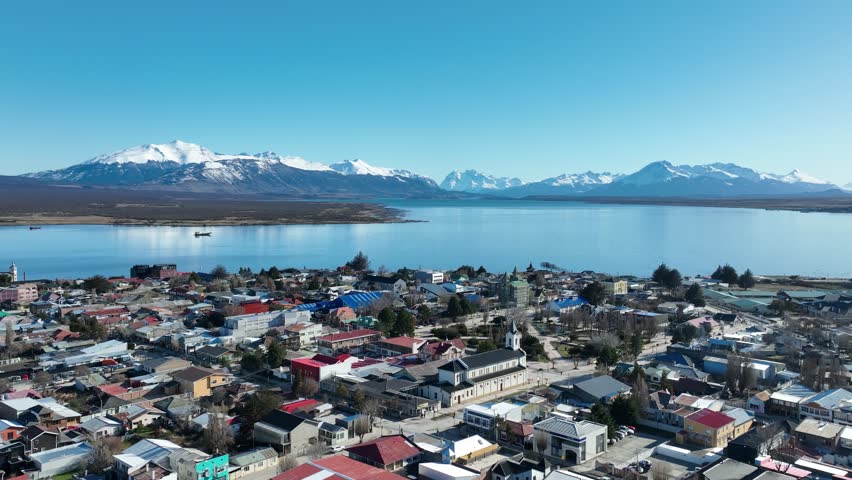 Patagonia Town In Puerto Natales Magallanes Region Chile. Modern City Center With Skyscrapers Reflecting The Urban Life. Outdoor Travel Destination Patagonia Glacier. Outdoor Snow Covered Aerial.