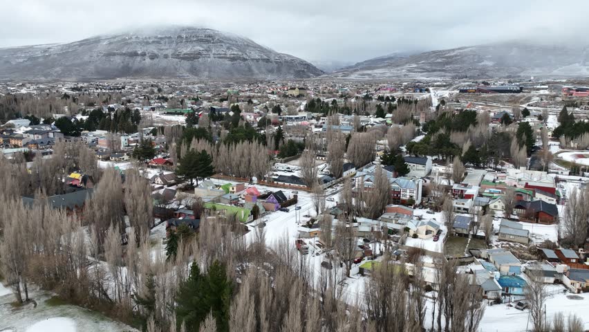 Snowy City In El Calafate Patagonia Argentina. Capturing The Hustle And Bustle Of A Vibrant City From Above. Snow Fall Lake Glacial Landscape Snow Mountain. Snow Fall Lagoon Nature.