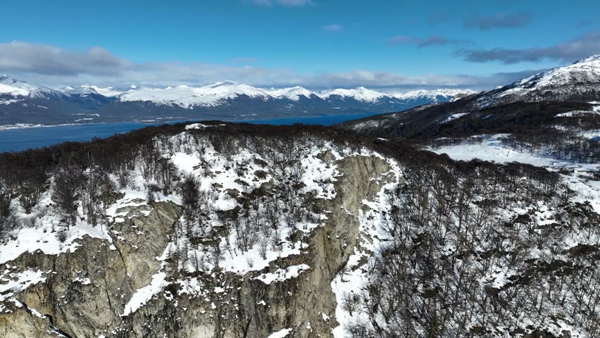 Guanaco Mountain In Ushuaia End Of The World Argentina. Captivating Aerial View Of Plantations Forming Geometric Patterns. Snowing Day Lake Glacial Blizzard. Glacial. Ushuaia End of the World.