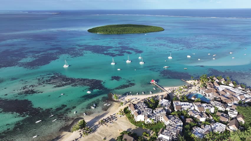 Blue Bay In Port Louis Mauritius Island Mauritius. Turquoise Ocean Waves Gently Crashing On Tropical Beach. Coast Sky Clouds Seaside Summertime. Coast Scenic Coastline. Port Louis Mauritius Island.