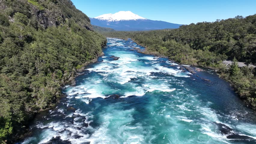 Petrohue Waterfall In Petrohue Los Lagos Chile. Breathtaking Aerial Footage Of Waterfalls As Natural Wonder. Snowing Day Lake Swiss Alps Snow Mountain. Forest Trees Swiss Alps Nature.
