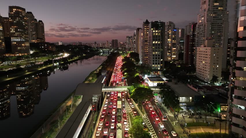 Freeway Traffic In City Sunset Sao Paulo Brazil. Breathtaking Aerial View Of Busy Traffic In A Freeway Road. Sunset Sky Downtown Cityscape. Sunset Outdoors Downtown . City Sunset Sao Paulo.