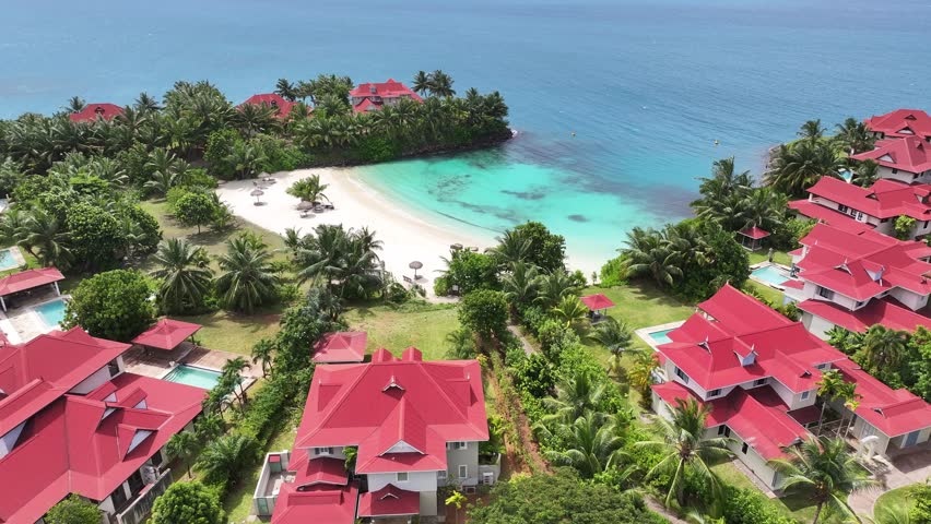 Mahe Island In Victoria Seychelles Islands Seychelles. Turquoise Ocean Waves Gently Crashing On Tropical Beach. Shore Sky Clouds Beach Sea. Shore Seaside Panorama. Victoria Seychelles Islands.