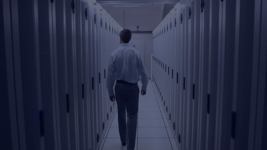 IT technician entering data center aisle, initiating floating code fragments swirling around him. Technology, cyber, data, innovation, digital, cybersecurity, network - Powered by Shutterstock - Get 15% off with code: PIKWIZARD15