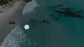 Drone panning over cove starting smartphone icon fading network branching out showing connectivity. Technology, connectivity, digital, network, wireless, communication, multimedia - Powered by Shutterstock - Get 15% off with code: PIKWIZARD15