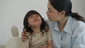 mother comforting her crying toddler girl - Powered by Shutterstock - Get 15% off with code: PIKWIZARD15