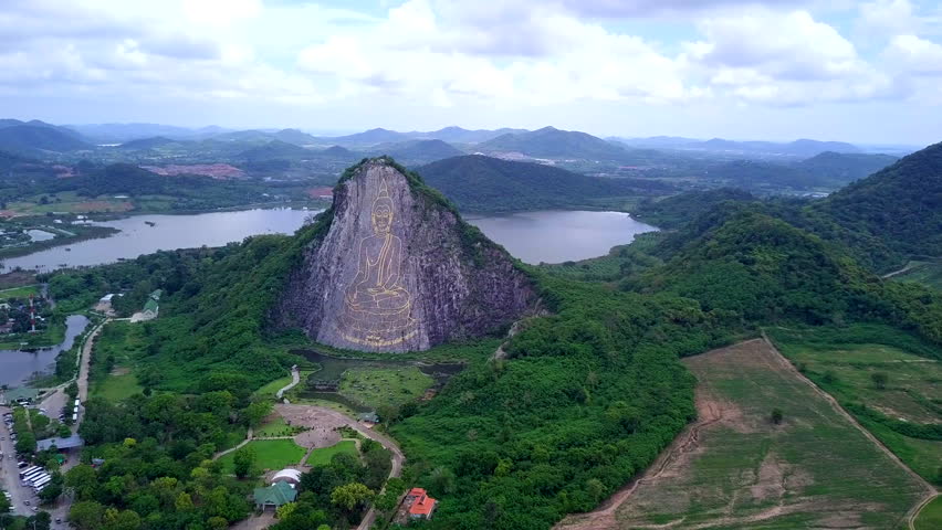 Buddha statue carved on the cliff face of Khao Chee chan Khao Chion, Pattaya, Chonburi, Thailand