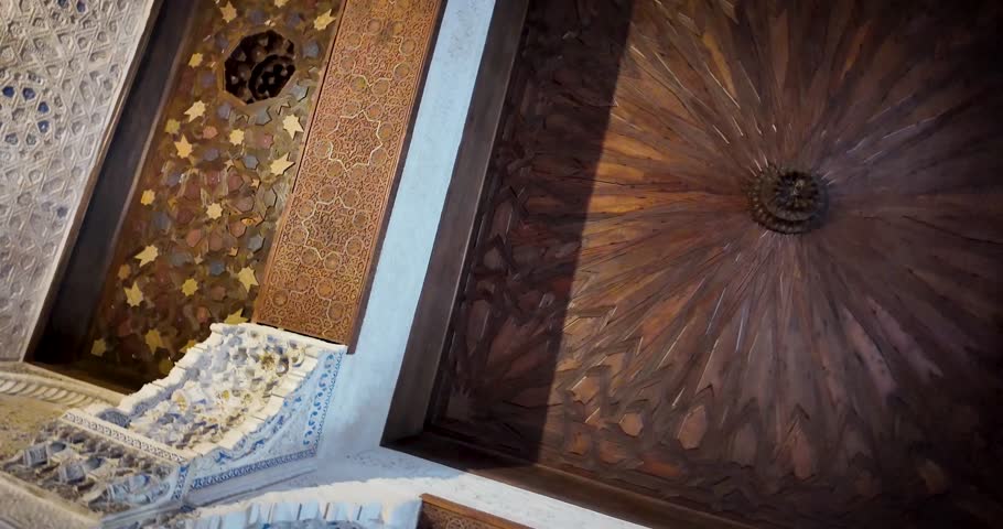 Panoramic shot of an interior hall highlighting the Mudejar patterns in the decoration of the Alhambra in Granada, Spain