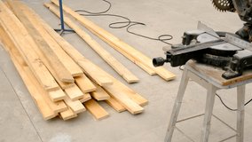 Cutting wood boards man in hands. Selective focus. - Powered by Shutterstock - Get 15% off with code: PIKWIZARD15
