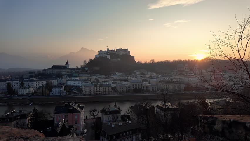 Salzburg, Austria: Dramatic sunset over Salzburg medieval old town with the famous Fortress Hohensalzburg