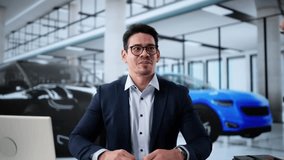 Smiling Hispanic Salesman Successfully Handing Over Keys To New Car Owners At Local Dealership During Business Hours. - Powered by Shutterstock - Get 15% off with code: PIKWIZARD15