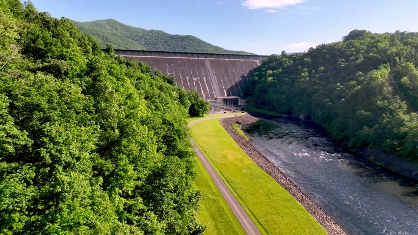 aerial push in to reveal fontana dam and fontana lake in north carolina, tva dam